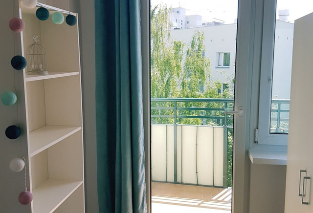 Room 5 with a balcony at Andrzej Romocki 18